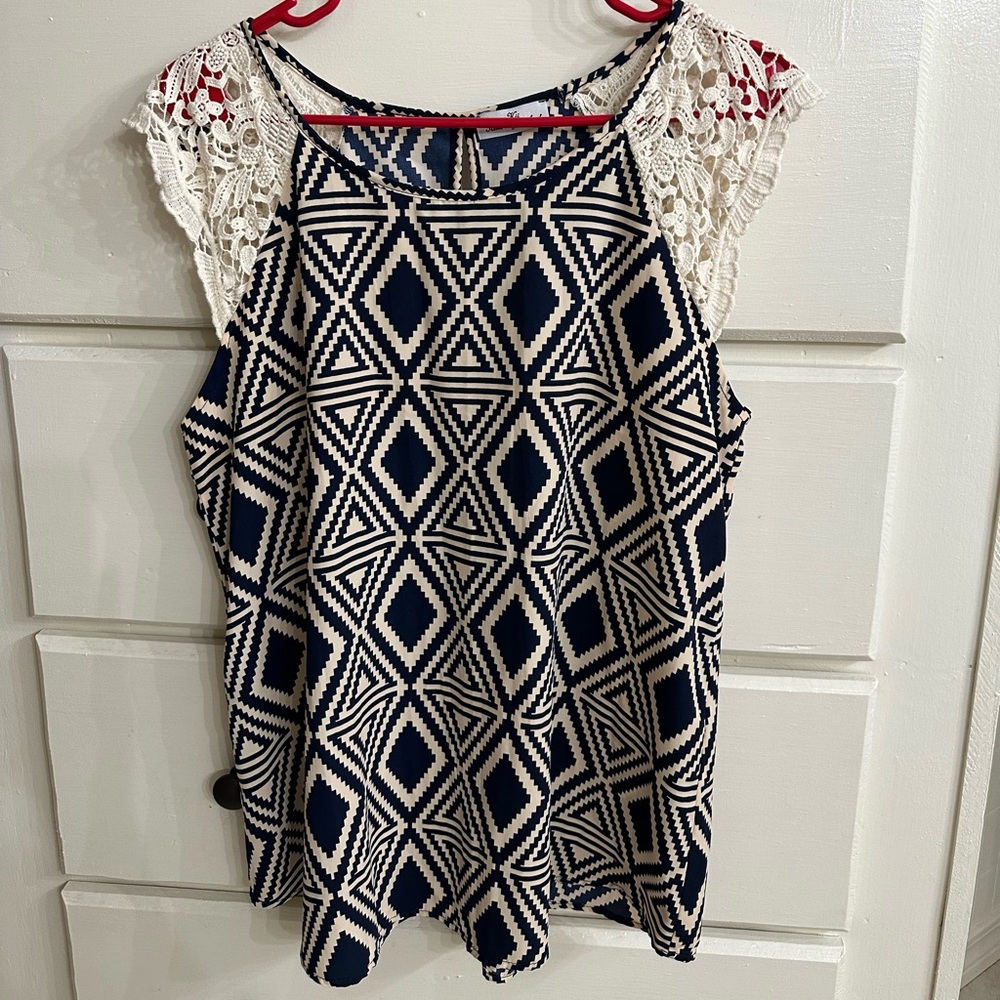 Navy and light tan top with lace cap sleeves